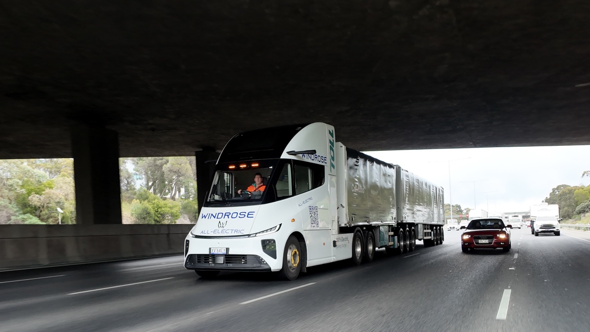 Windrose B-double on the road with a Toll trailer